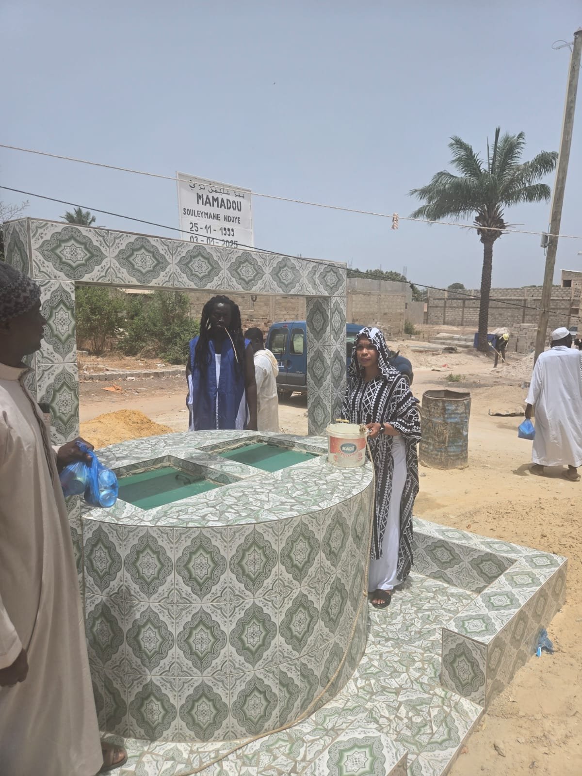 Le puits avec les villageois